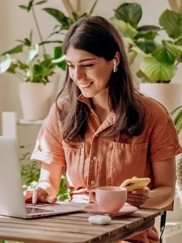 Hero Happy Client at a Computer